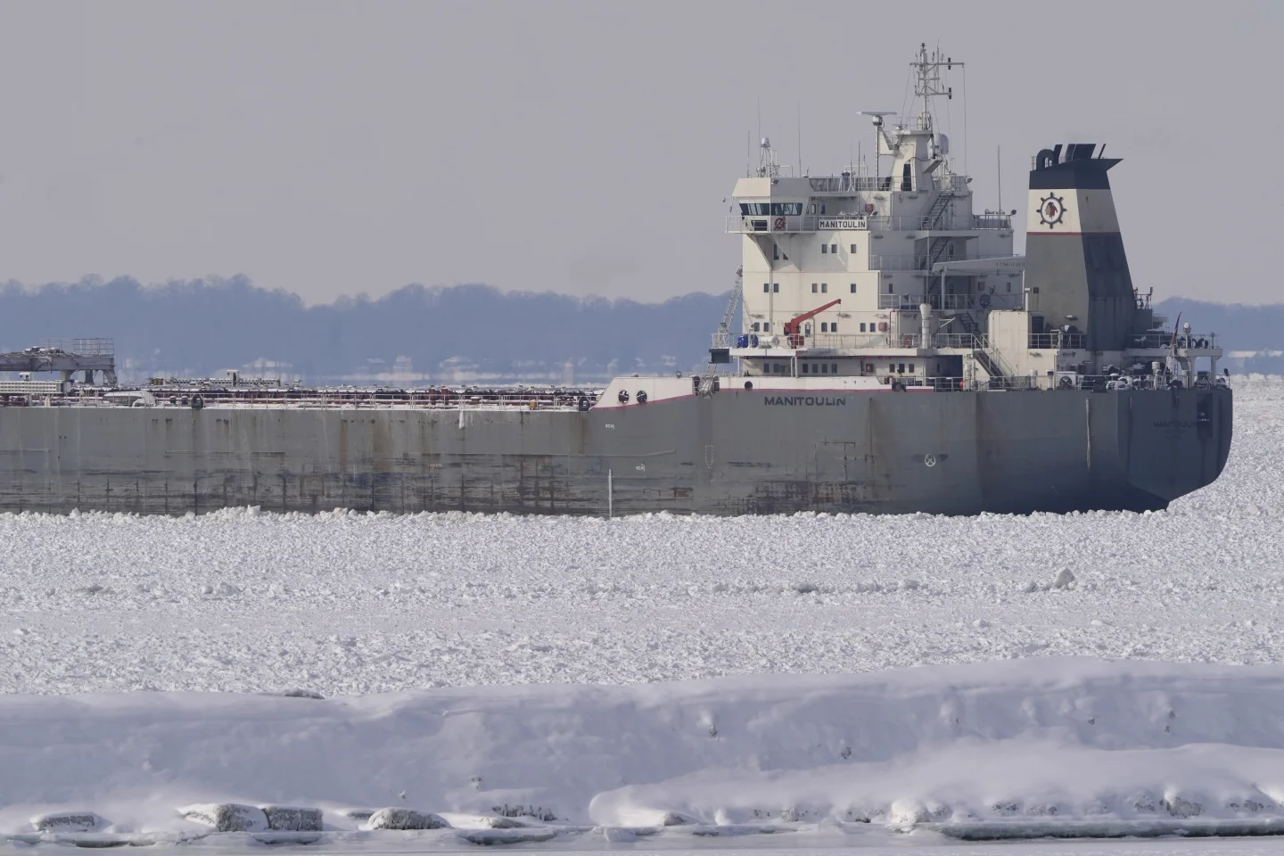 Freighter trapped in ice on frozen Lake Erie, stranding the vessel