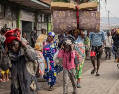 Rebels claim control of a city in DR Congo as thousands of civilians flee the conflict