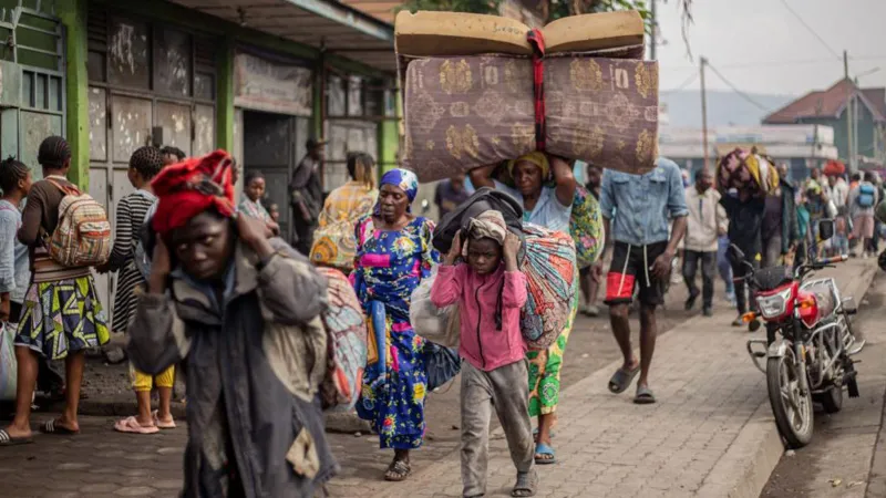 Rebels claim control of a city in DR Congo as thousands of civilians flee the conflict